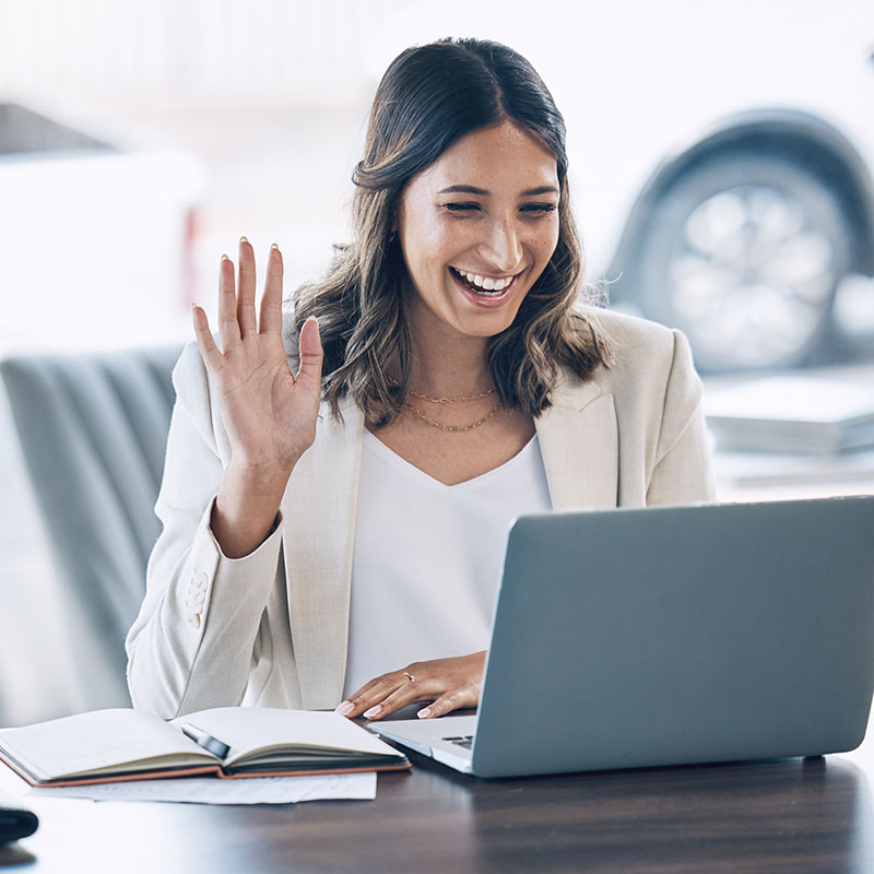 Association header 800x800px Woman, wave or video call on laptop conference,training workshop or virtual consulting appointment. Smile, happy or attorney on technology webinar and hello or greeting hands