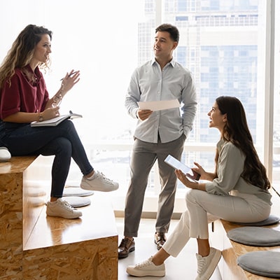 olleagues discussing ideas during a workplace learning session